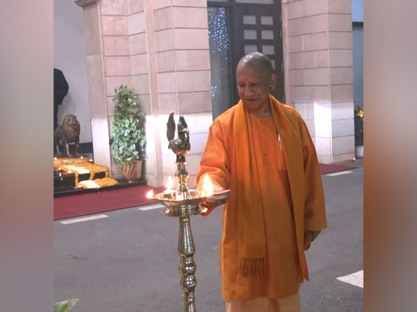 Lucknow: CM Yogi lights 'Ram Jyoti' at his residence after 'Pran Pratishtha' ceremony