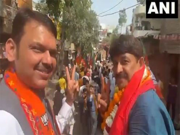 Maharashtra Dy CM Fadnavis holds roadshow in Delhi for BJP's Manoj Tiwari, says "BJP will win all seven seats"