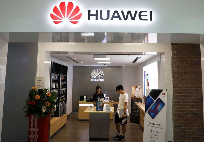 UPDATE 2-Australia bans China's Huawei from mobile network build over security fears