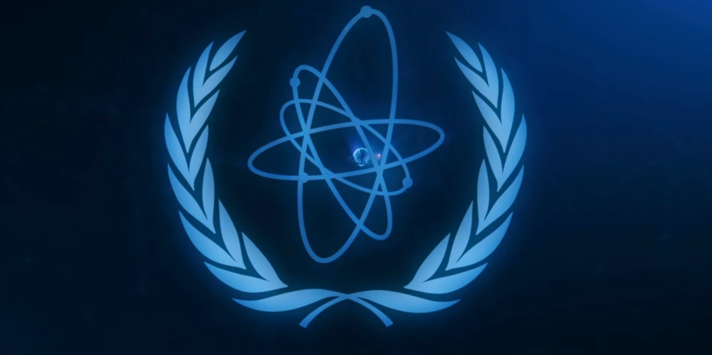 Организация магатэ занимается. Международное агентство по атомной энергии (МАГАТЭ). ООН МАГАТЭ. Флаг МАГАТЭ. МАГАТЭ 1957.
