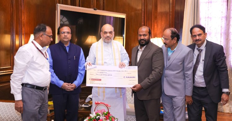 Repco Bank Presents ₹19.08 Crore Dividend Cheque to Amit Shah
