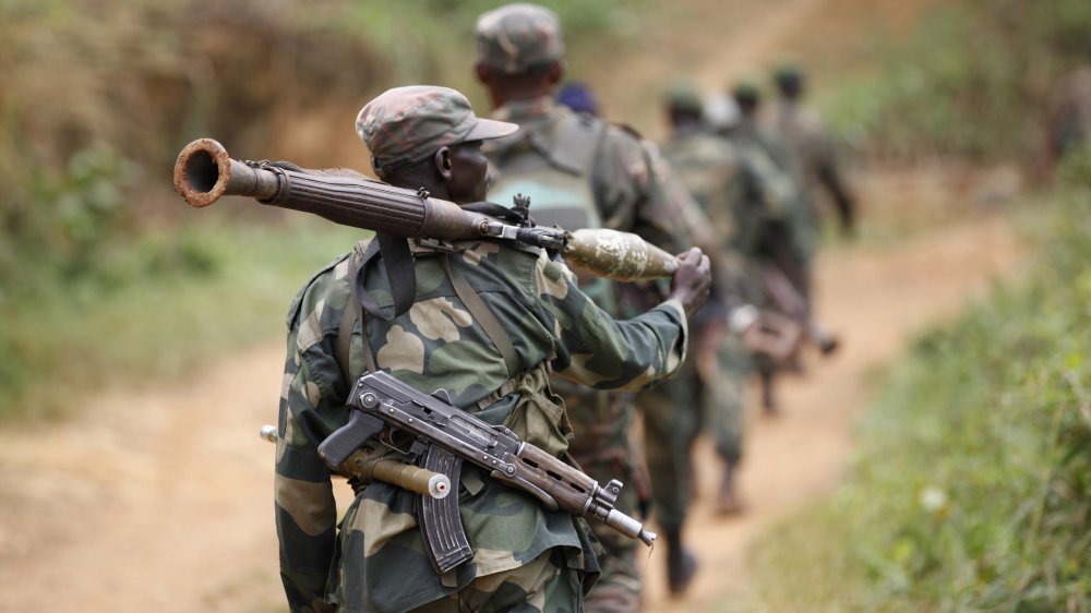 UPDATE 1-Rebel attack in Congo Ebola zone kills 18