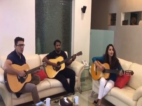 Madhuri Dixit showcases her musical craft by playing guitar