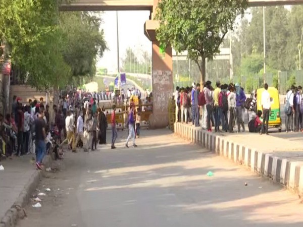 COVID-19: People stranded at Anand Vihar bus terminal amid lockdown in Delhi 
