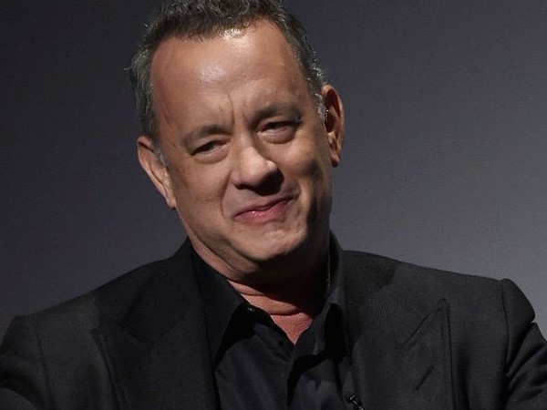 Tom Hanks reveals why he loves to crash wedding pictures