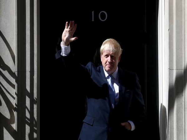 UK's Boris Johnson puts his feet up in Macron's palace