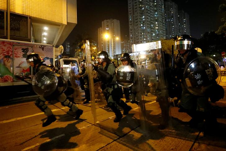 WRAPUP 8-Hong Kong police turn water cannon on protesters, fire tear gas