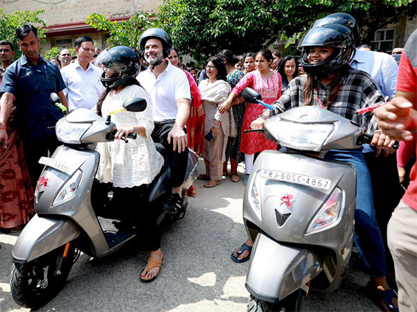 Rahul Gandhi rides pillion on girl student’s scooter in Jaipur