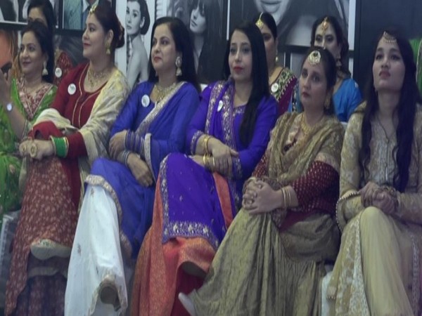 Mothers walk the ramp for a fashion show in Aligarh