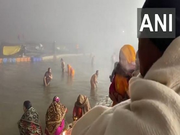 Prayagraj: Devotees take holy dip at Triveni Sangam during Magh Mela 