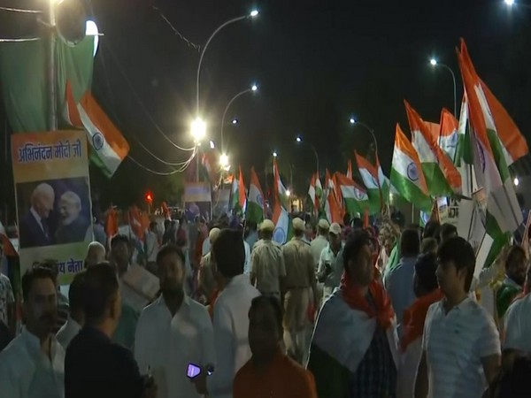 BJP workers gather outside Delhi's Palam airport to welcome PM Modi