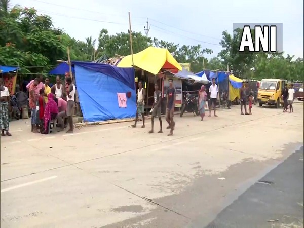 Assam flood: Locals take shelter on embankments, highways in Nagaon 
