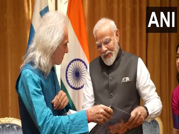 PM Modi meets Greek researcher and musician Konstantinos Kalaitzis in Athens