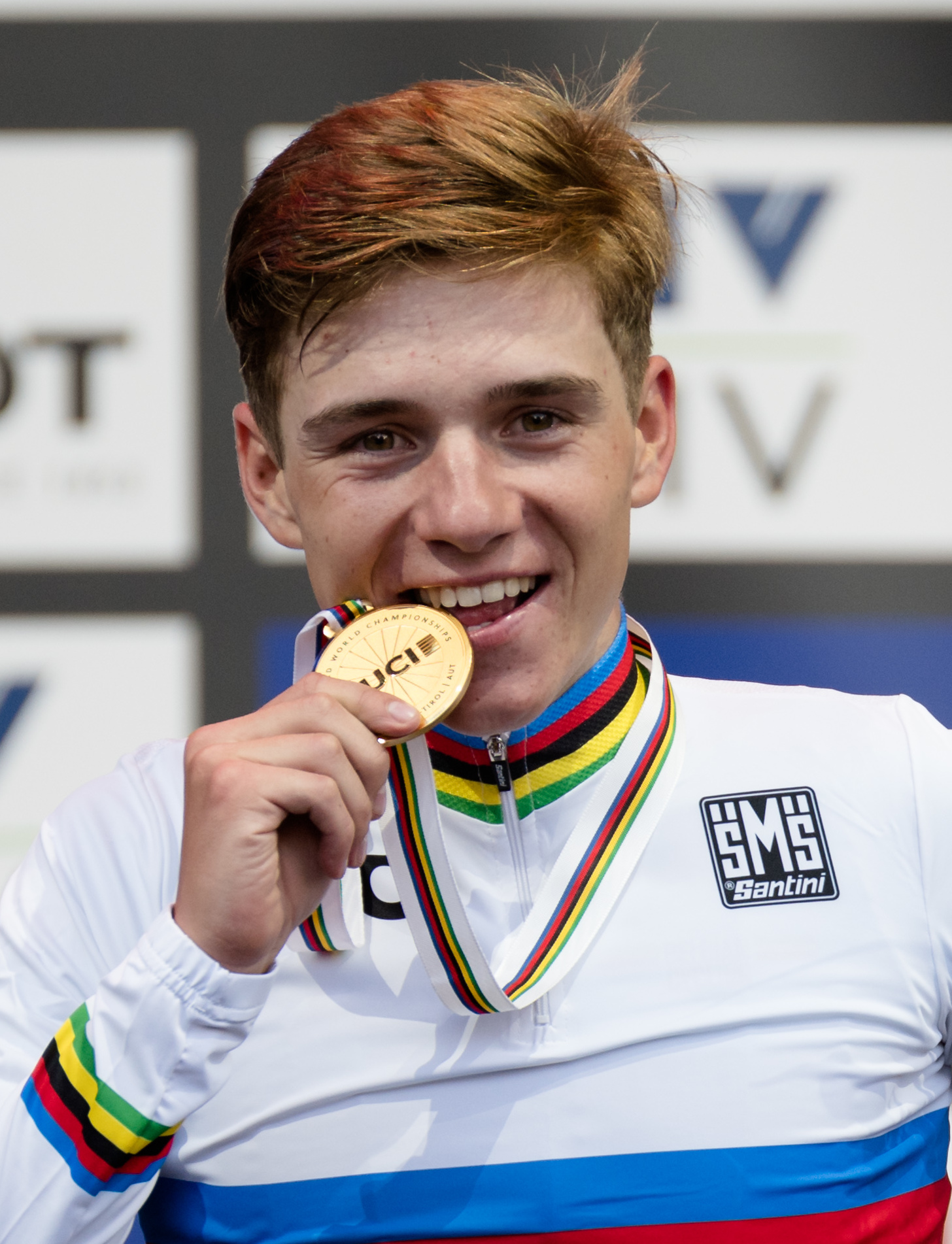 Cycling-Evenepoel rides solo breakaway to world road race title