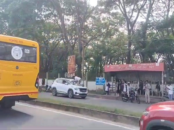 High-Speed Escape: Traffic Cop Dragged on Car Bonnet in Karnataka