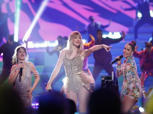 Taylor Swift performs with Halsey and Camila Cabello at AMAs