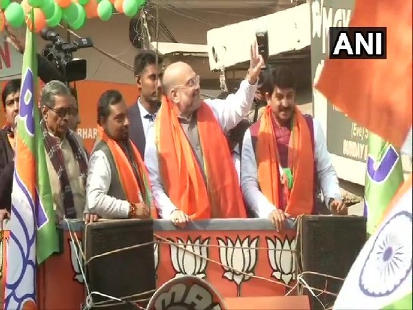 Amit Shah holds roadshow in Gonda area for Delhi assembly polls