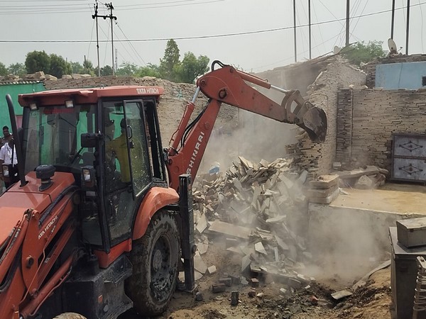 Administration demolishes illegal constructions of accused involved in cow slaughter in MP's Morena
