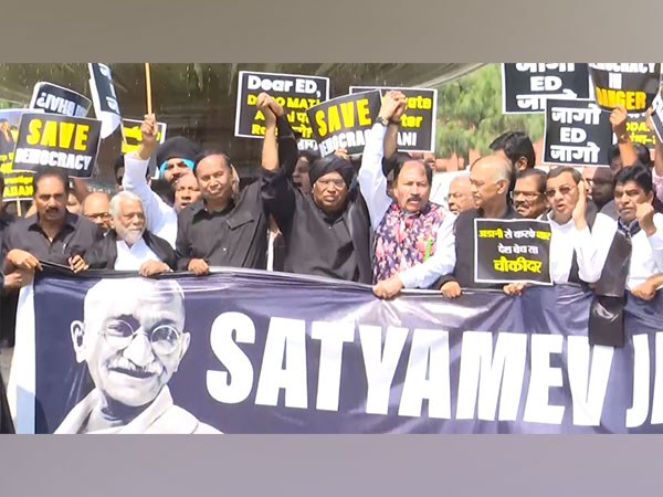 Opposition MPs march towards Vijay Chowk in black attire in a bid to show unity against Centre