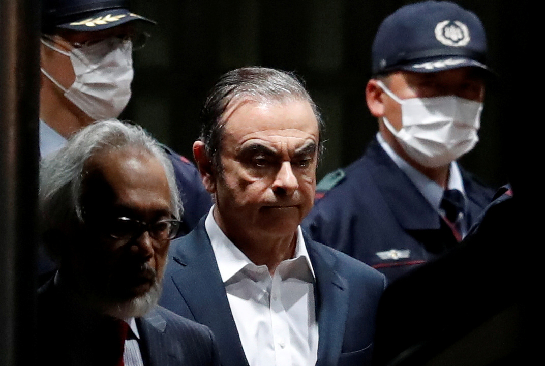 UPDATE 1-Ghosn fled Japan after security firm hired by Nissan stopped surveillance-sources