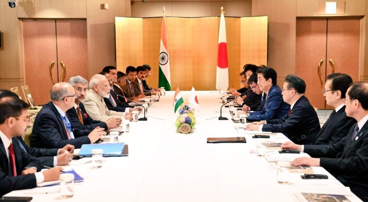 PM Modi meets Japanese PM Shinzo Abe in Russia