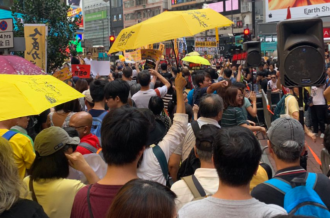 UPDATE 2-Tens of thousands rally in Hong Kong against China extradition bill