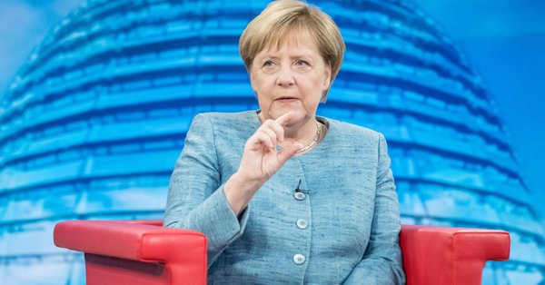 Focus on Europe, EU commissioner tells Germany; spymaster saga drags on