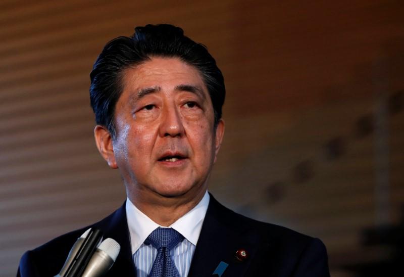 Japan PM Abe to keep key ministers in posts in cabinet reshuffle (UPDATE 1)