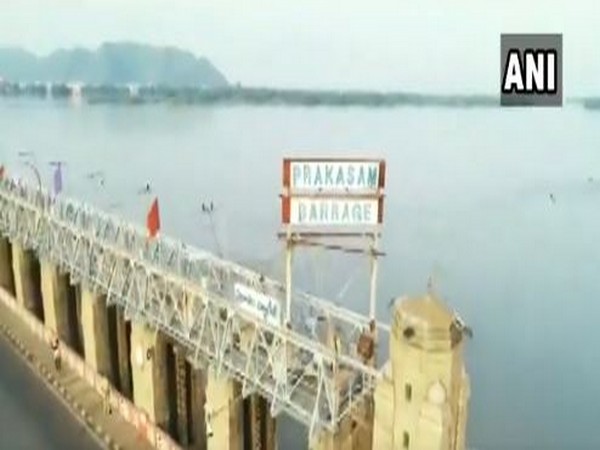 Andhra govt releases water into Krishna canals from Prakasam Barrage following incessant rain