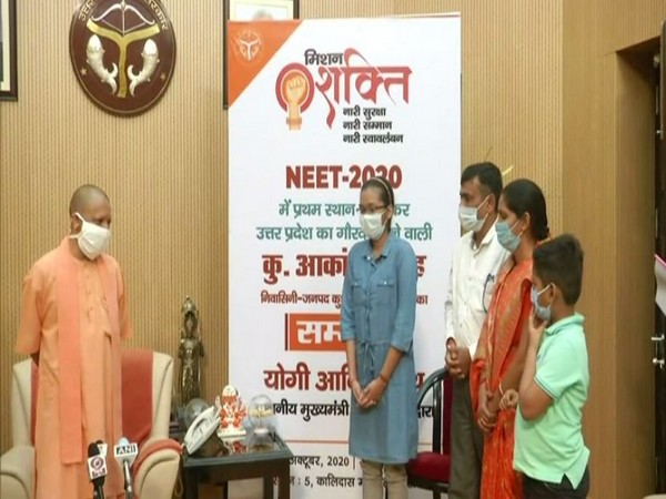 Yogi Adityanath felicitates UP NEET topper Akanksha Singh