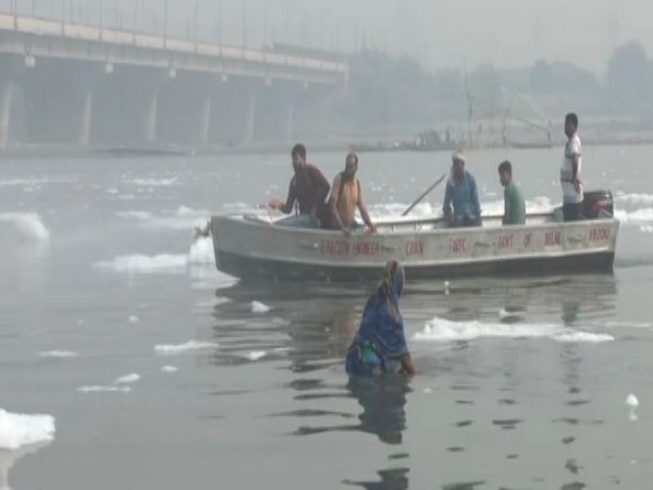 Chhath Puja: Delhi Jal Board sprays chemicals in Yamuna to treat toxic foam