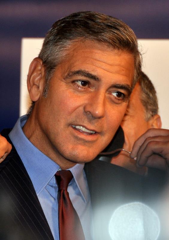 George Clooney says he's cut his hair 'for 25 years'