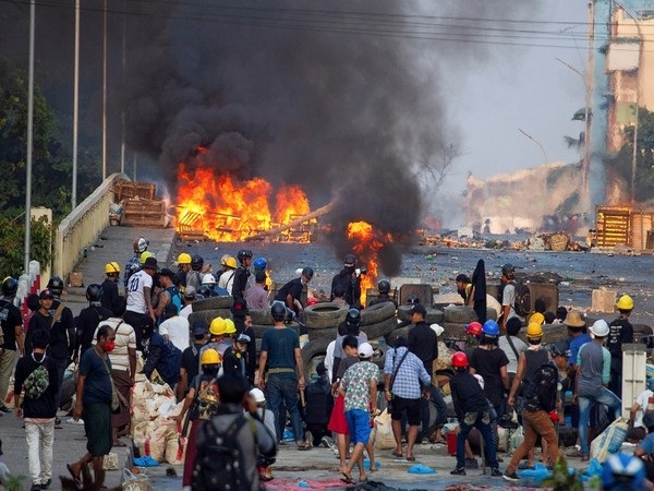 WRAPUP 3-Four killed in Myanmar protests as junta cracks down on online critics