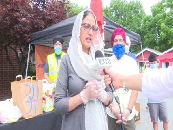 Sikh community hosts drive-thru food distribution for 2,100 families