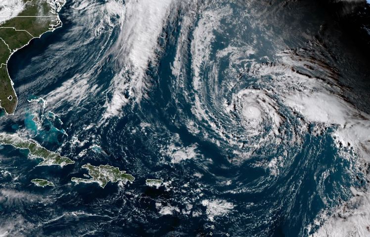 Hurricane Oscar moving westward with little change in strength: NHC