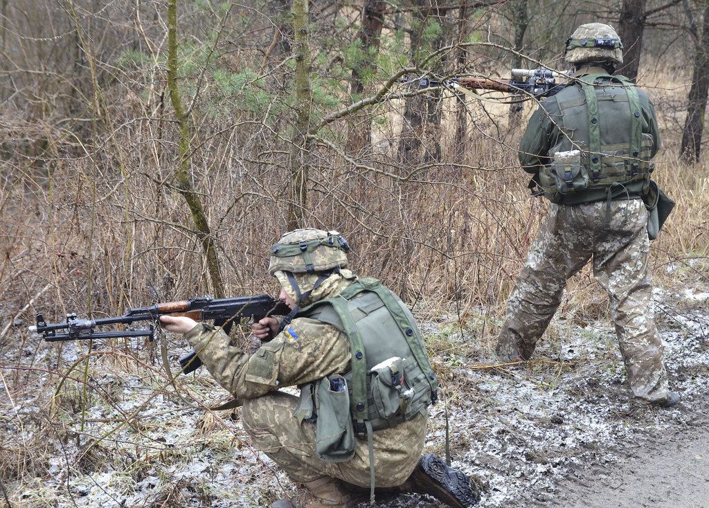 Ukraine, separatists begin planned troop withdrawal in eastern region - witness