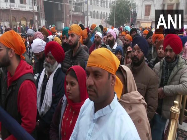 Devotees offer prayers at Golden temple in Amritsar on Guru Gobind Singh Jayanti  