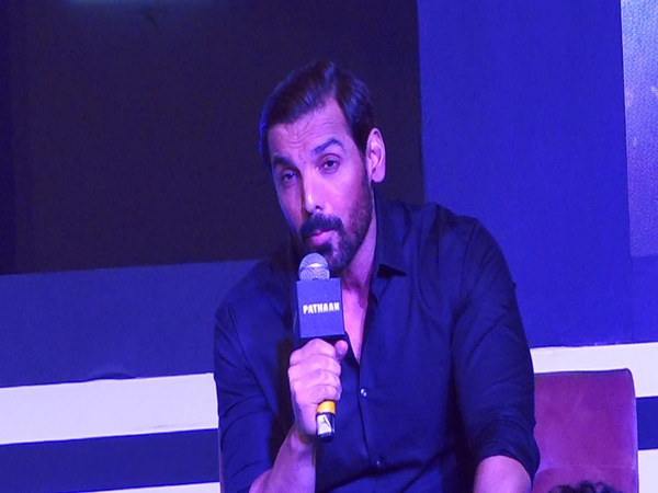 John Abraham gives witty reply to fan chanting "Shah Rukh Khan is back" at 'Pathaan' event