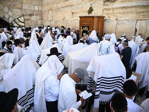 'The people of Israel need the blessings now more than ever': Jews flock to Western Wall