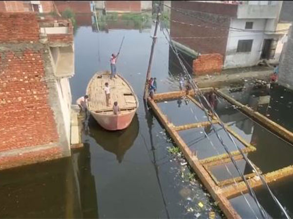 Severe waterlogging in Moradabad forces residents to use boats for commute after heavy rains