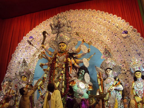 Two Durga Pujas themed on common man's struggle