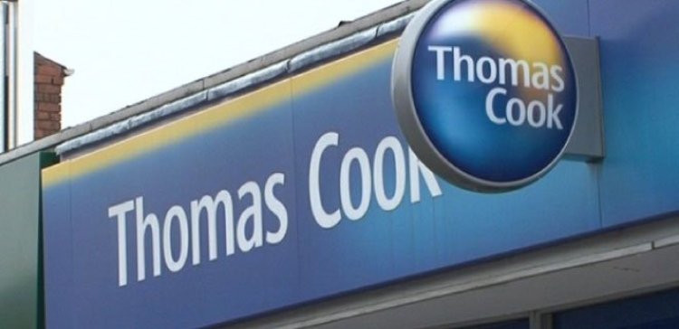 UPDATE 1-Thomas Cook cuts profit forecast, suspends dividend on weak British market