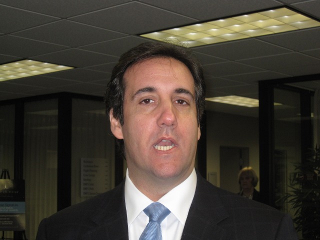 Cohen to report to prison for three-year sentence for arranging hush payments 