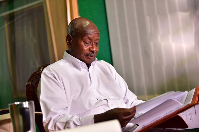 Ugandan novelist, critic of president, charged with communications offences 
