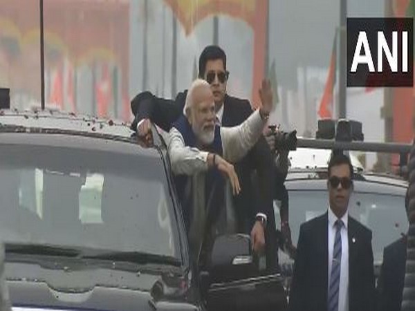 People shower flowers as PM Modi takes lap of honour on his way to inaugurate Ayodhya Railway station