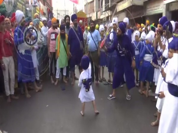 Punjab: People celebrate 1st Prakash Purb of Sri Guru Granth Sahib in Amritsar