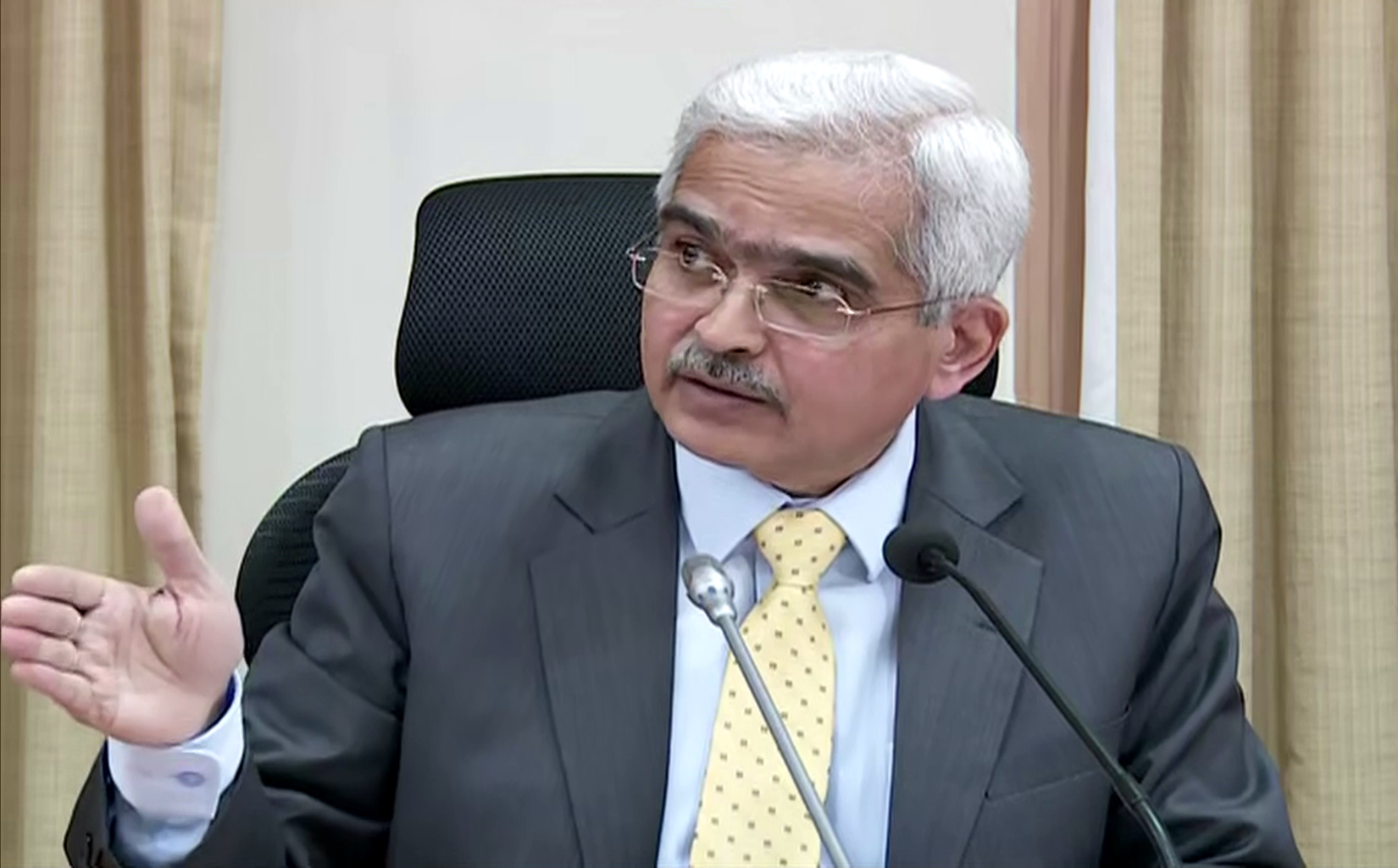 RBI Governor warns of higher bad loans, uncertain economic outlook