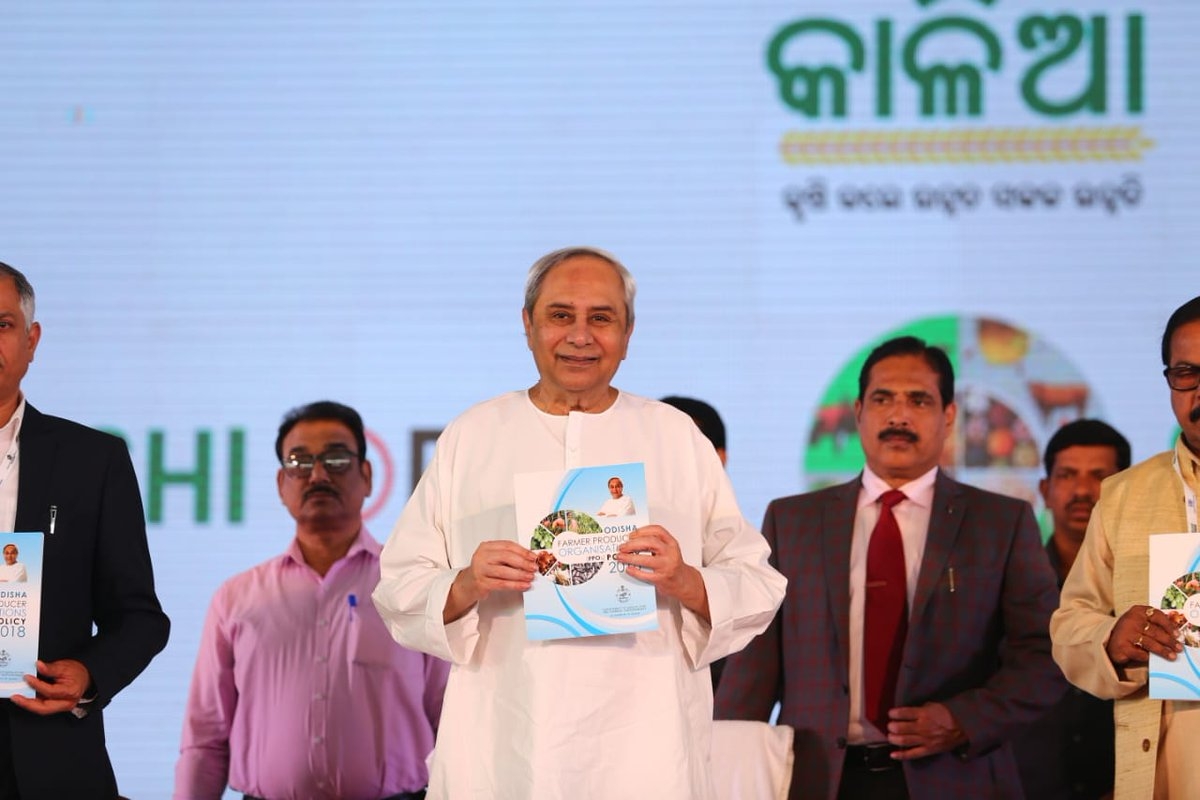 Patnaik greets slum dwellers with houses and land patta
