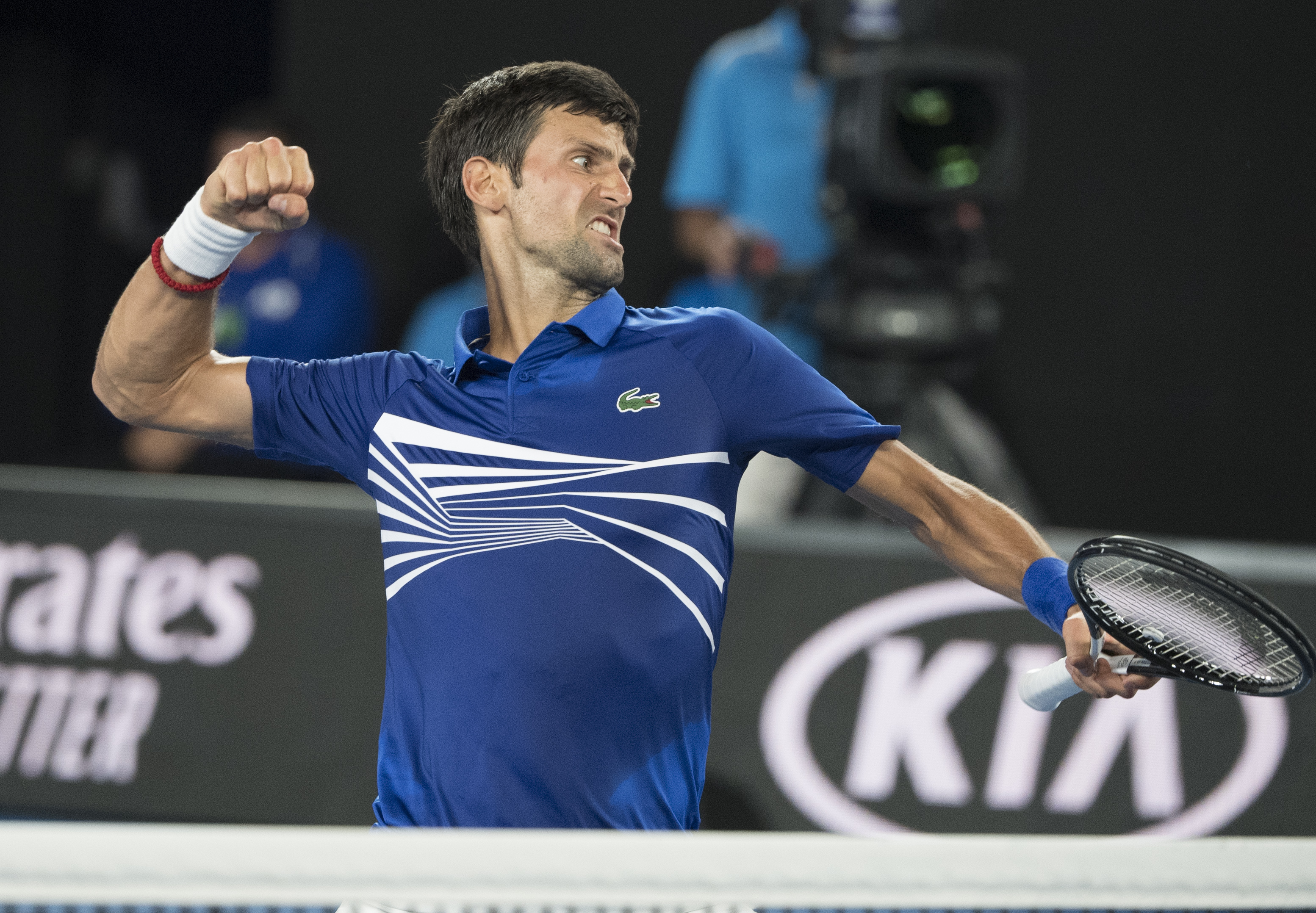 Tennis-Djokovic cruises into second round in Tokyo