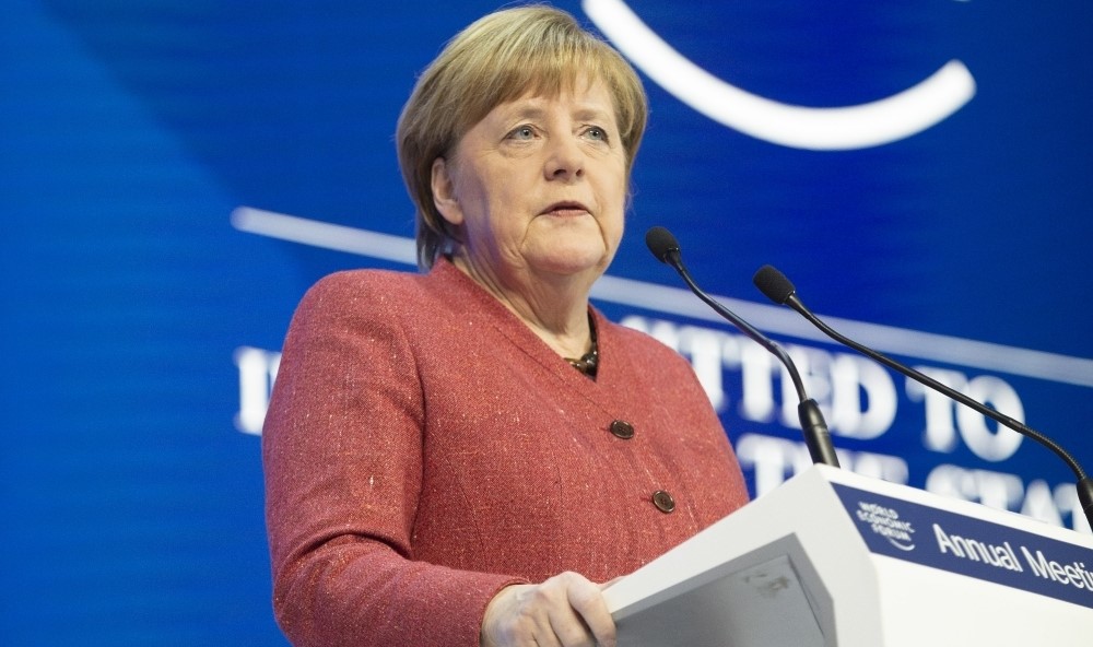 UPDATE 1-Merkel hopes China-U.S. trade problems will be over soon